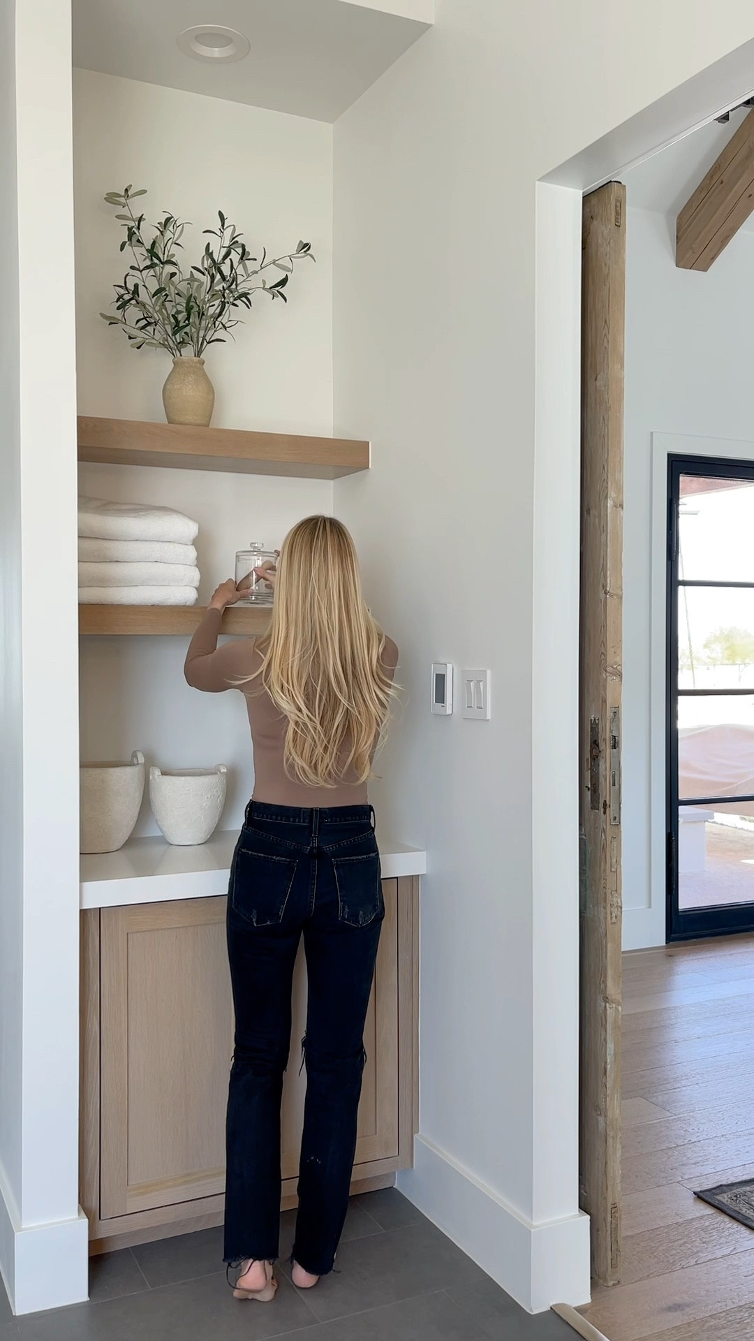 Open shelf styling for a spa-like feel.

#LTKhome