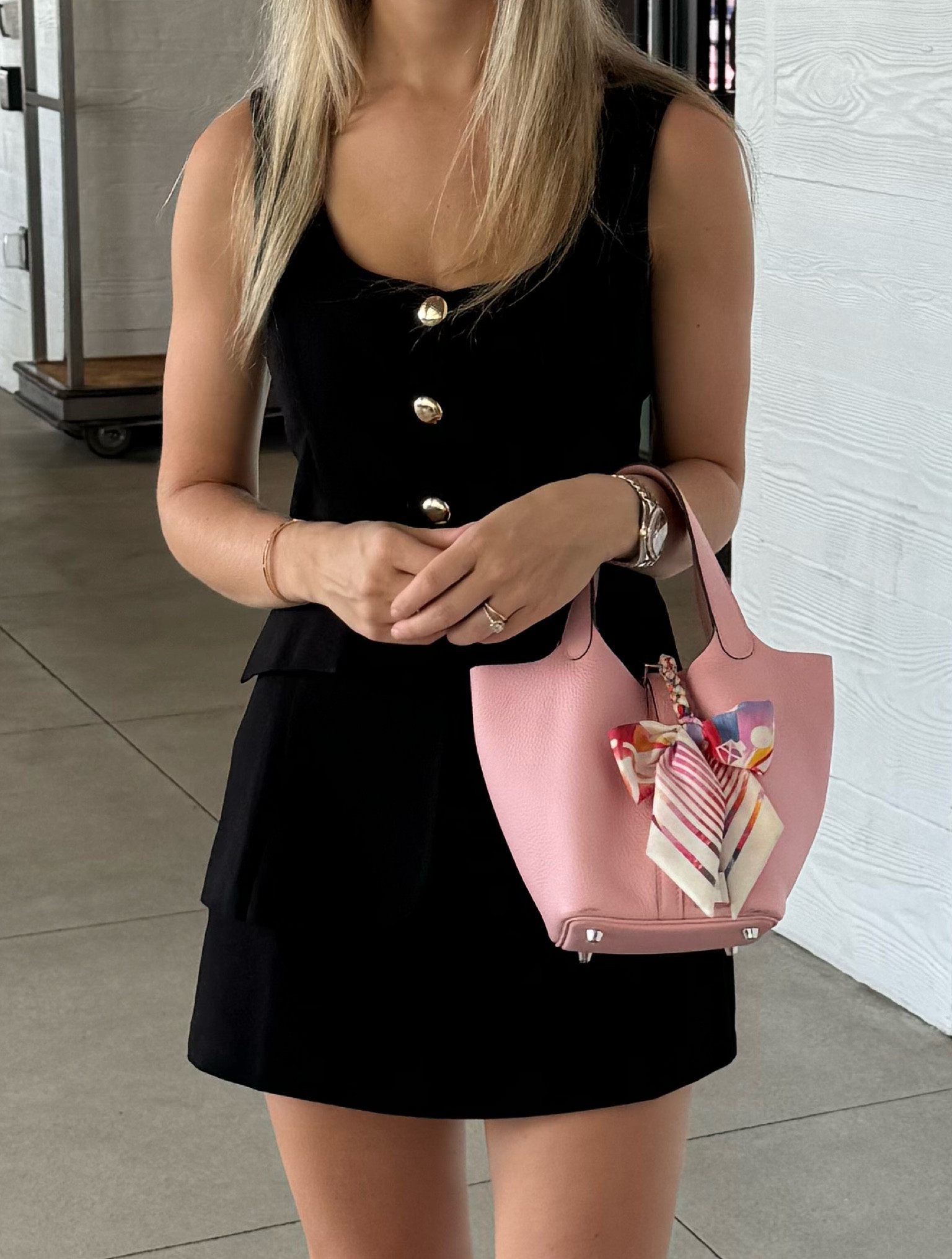 this outfit has been on repeat 🖤
I love that this romper/set has shorts attached under the skirt along with the attached vest in the back for a seamless look 🫶🏽 the gold buttons and pockets are perfect details and it comes in white, blue, red, and so many more colors.. how many is too many I may need to add two more colors into my closet 🤭 love to pair it with my picotin 18 in rose sakura along with a twilly and some (rose) gold jewelry and black sandals 🖤 linked similar classy bucket bags for you along with my outfit and more 🩷

#LTKItBag #LTKFindsUnder100 #LTKStyleTip