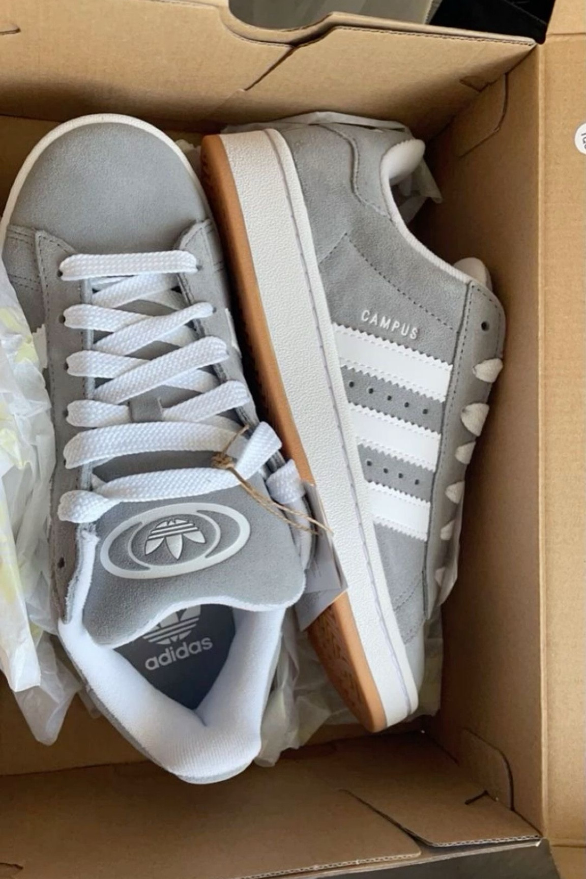 Step up your style game with these classic Adidas Campus sneakers! Sleek grey suede with iconic white stripes, perfect for any casual outfit. Don't miss out—get yours now!

#LTKStyleTip #LTKShoeCrush #LTKGiftGuide