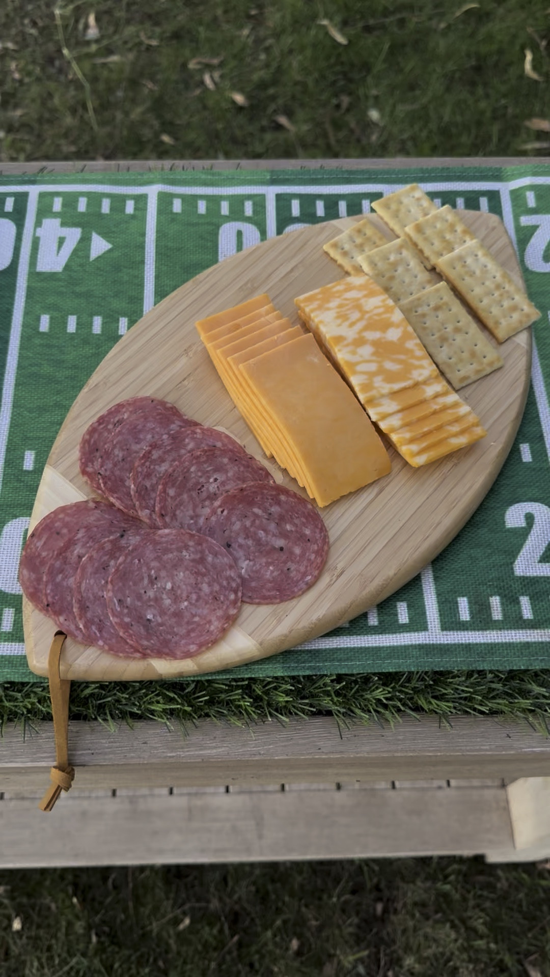 The best football shaped charcuterie board for your tailgate, Thanksgiving, Friendsgiving, the Super Bowl and more! Love this touchdown table runner!! 🏈

#LTKParties #LTKHome #LTKFindsUnder50