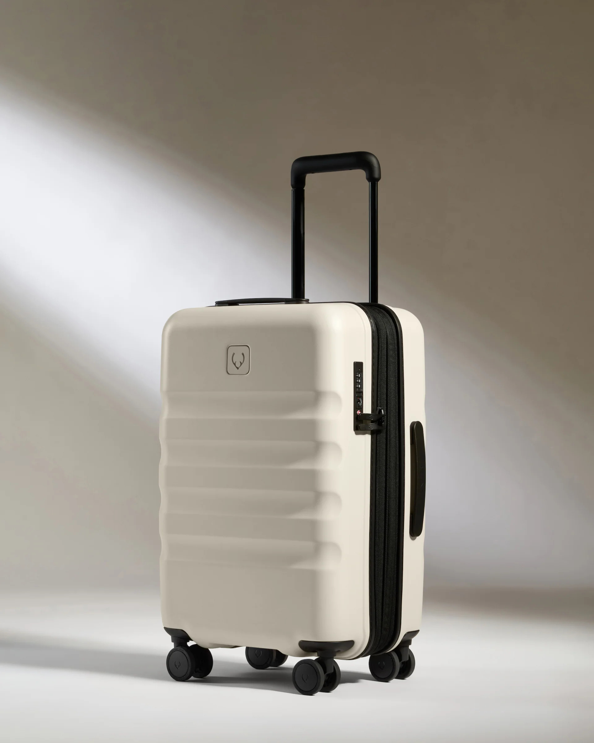 Expandable Carry-on Luggage in Taupe - Icon Stripe | Lightweight & Hard Shell Suitcase | Antler USA