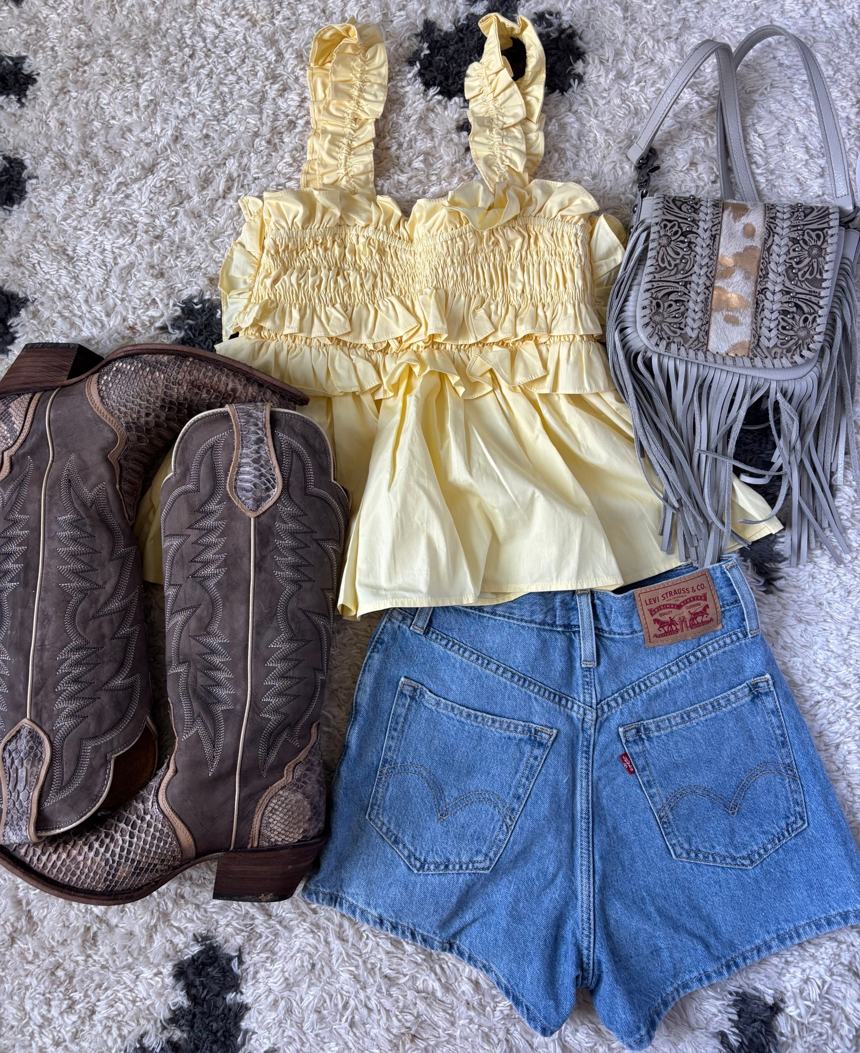 Cutie summer date night fit! I linked the top in blue and yellow! Love this yellow for spring and summer! Also so fun how the stitching in these Idyllwind boots matches the yellow in this top! These are Levi’s mom shorts but linked some similar options as well!

#LTKShoeCrush #LTKSeasonal #LTKStyleTip