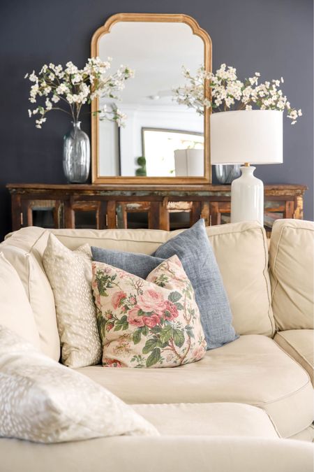 A beautiful floral pillow cover and some dogwood stems bring a touch of spring to my living room.

#LTKhome #LTKSeasonal