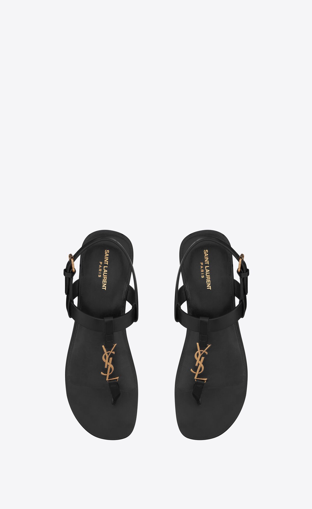 FLAT SANDALS MADE WITH METAL FREE TANNED LEATHER, WITH A T-STRAP ARCH BAND AND AN ADJUSTABLE BUCK... | Saint Laurent Inc. (Global)