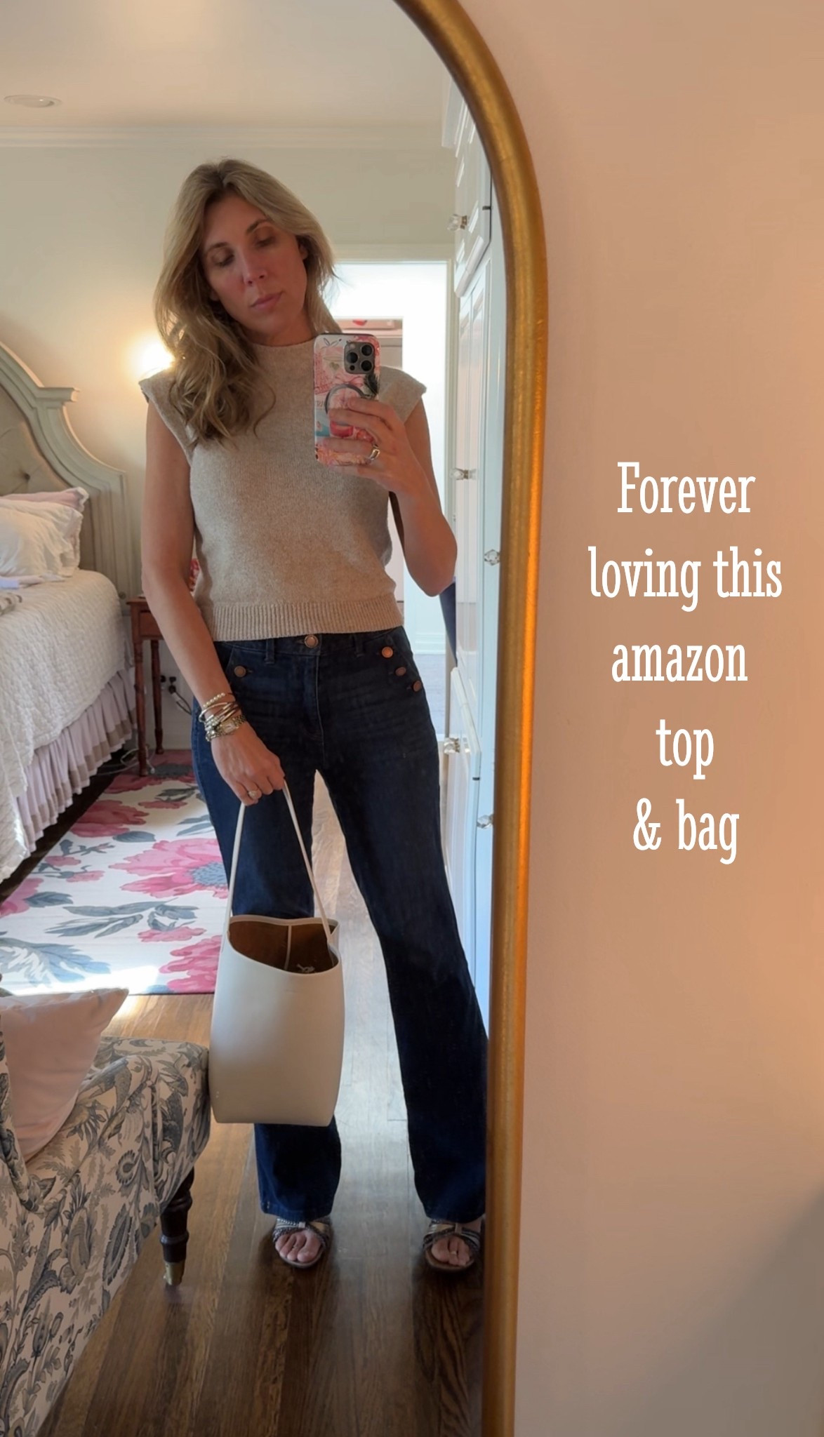 One of my most worn Amazon purchases is this top! I’ve worn it over and over and if anything happens to it, I would buy it again immediately.

This bag has been great too! I haven’t had it for as long as the top, but it’s already getting a lot of use. It’s a great alternative for The Row bag that looks very similar. 

#LTKootd #LTKOver40
