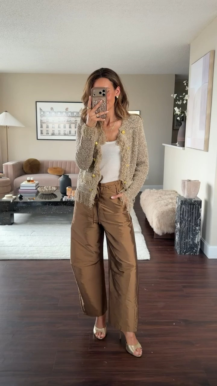 Our beloved taffeta pants are back in stock in the bronze color so I had to wear it again, this time with this gorgeous fringe knit from fall 26 presentation at NYFW! Love the bold details, removable shoulder pads and gold buttons.

#LTKootd #LTKOver40 #LTKSeasonal