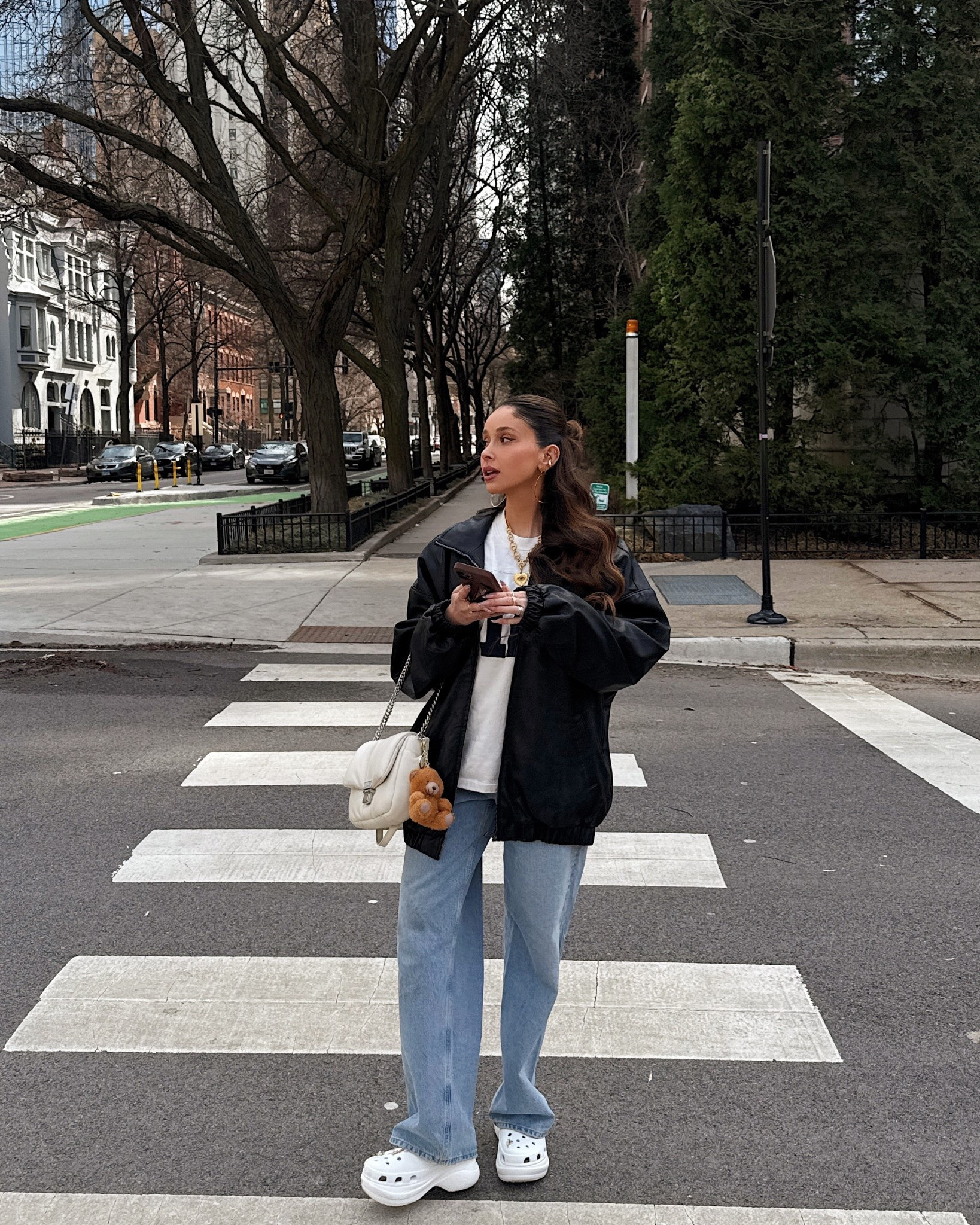 a very sporty spring in crocs bae clogs, house of cb faux leather bomber, Aritzia varsity shirt and agolde straight jeans 

#LTKSeasonal #LTKStyleTip #LTKFindsUnder100