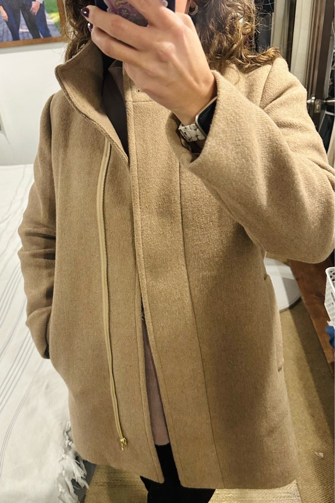 Wowza at this coat. An updated city coat. Love the full zip closure and button neck. The collar flips down if you don’t want or need the popped look. Pockets and fully lined interior. I went with this classic camel color. 
Wearing a size 6  

#LTKHoliday #LTKSeasonal #LTKGiftGuide