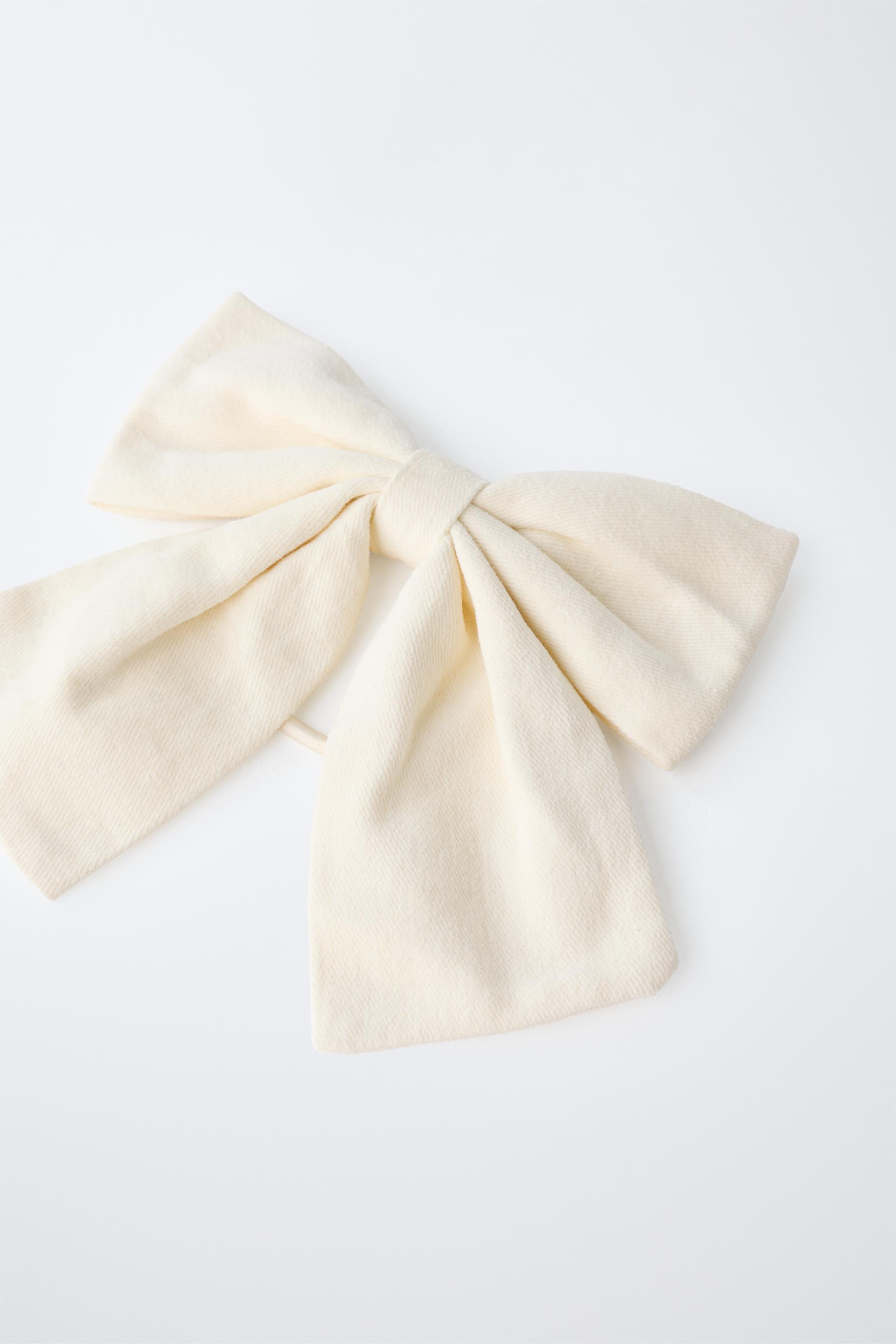 Elastic scrunchie with bow appliqu\u00e9 and barrette clip. Contains small parts, not recommended... | Zara US