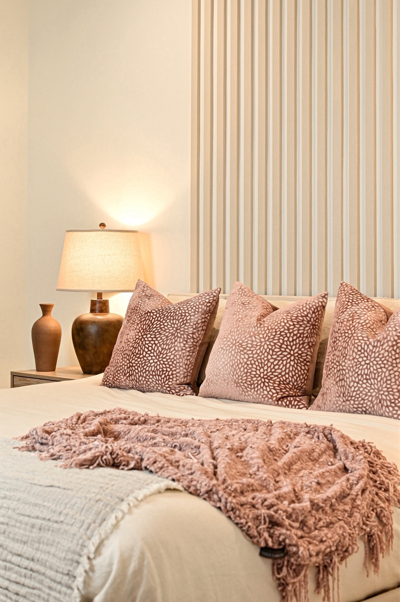 Cozy bedroom details 🤍 loved creating this space for our guests to relax in. So many questions about our bedding and our unique accent wall design. Added a pop of brown lamps to make the space feel more cozy and inviting 🤎#LTKunder50 #LTKneutraldecor decor

#LTKstyletip #LTKhome