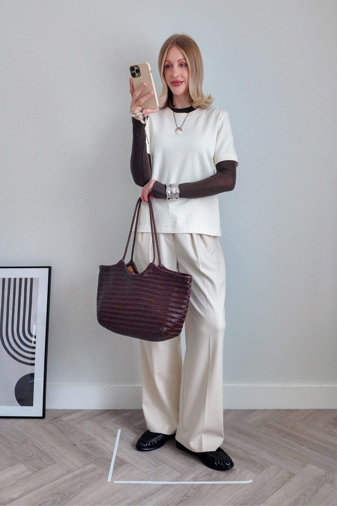 The row get the look - heavyweight t-shirt - brown top - woven bag - cream trousers - wide leg trousers - brown loafers - spring outfit - Abercrombie - Arket 

#LTKFashionMonth #LTKspring #LTKeurope