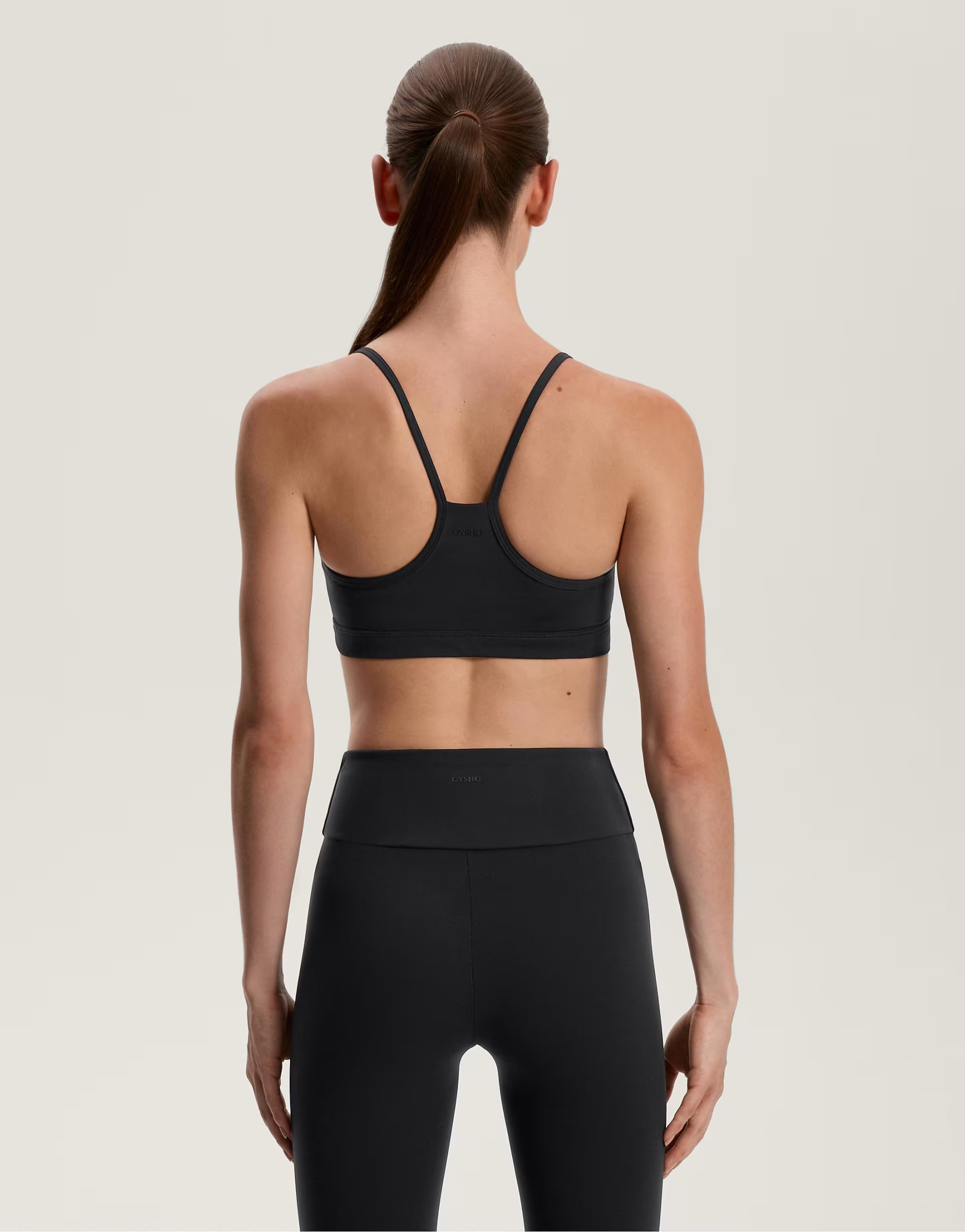 Home› Search results for black sports bra› OYSHO light support comfortlux sports bra with cup... | ASOS (Global)