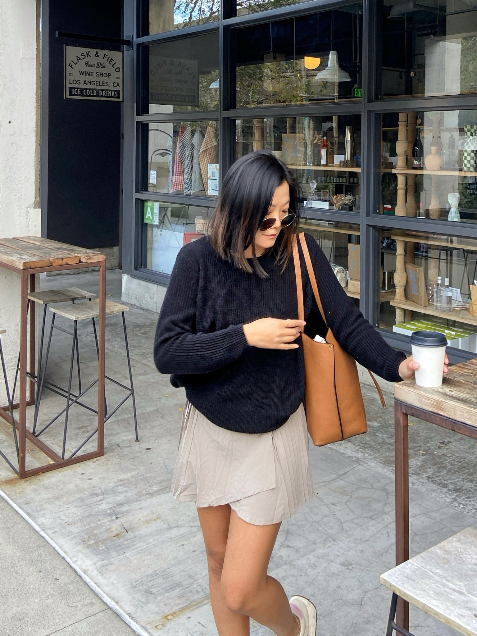 Black knit sweater, tennis skirt, pleated mini skirt, neutral outfit, mini skirt outfit 

#LTKfindsunder100 #LTKstyletip #LTKfindsunder50