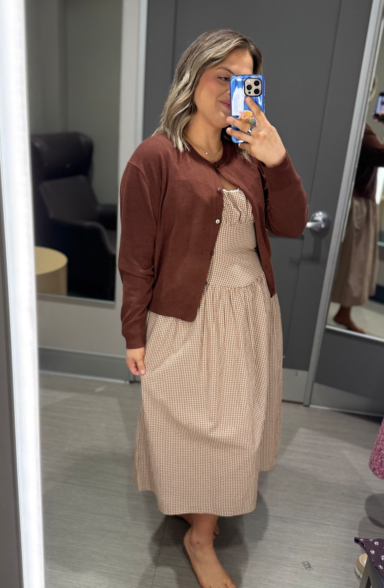 The easiest layered neutral look 🤎 I threw this chocolate cardigan over my gingham dress and it instantly made it feel cozy + elevated. Perfect for transitional weather and such a timeless combo. #LTKStyle #LTKFinds #LayeredLook #NeutralOutfit #BrownCardigan #GinghamDress #MomStyle #TransitionalStyle #CasualChic #AffordableFashion 

#LTKU #LTKootd #LTKMidsize
