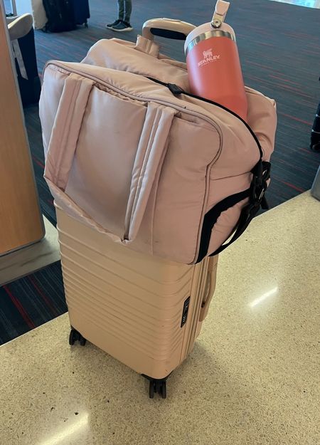 I’ve had many carry ons but these are elite. The Bies roller carryon rolls all directions smoothly, bas a sturdy zipper and nice interior pockets. The Calpak luka duffle is my favorite duffle for flights because it fits under the seat in front of you comfortably without crushing it. I use the Stanley flip straw for travel because is leak proof and more hygienic than their cult favorite quencher because the straw folds down  

#LTKFind #LTKitbag #LTKtravel