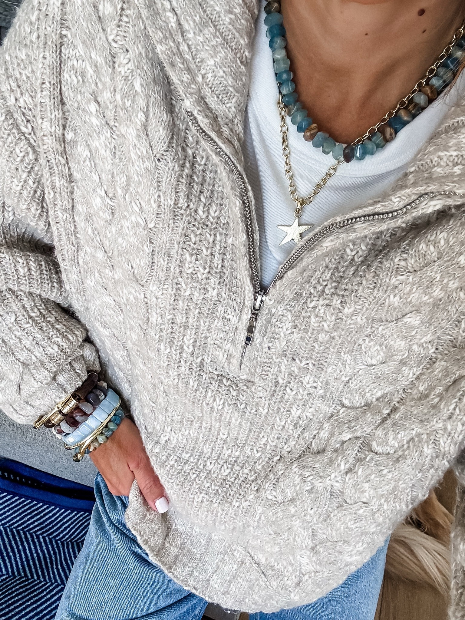 Copy the code from any of the items in the carousel for 20% off at Abercrombie. Jewelry code HOUSEOFLEO20. Medium sweater. Star necklace.