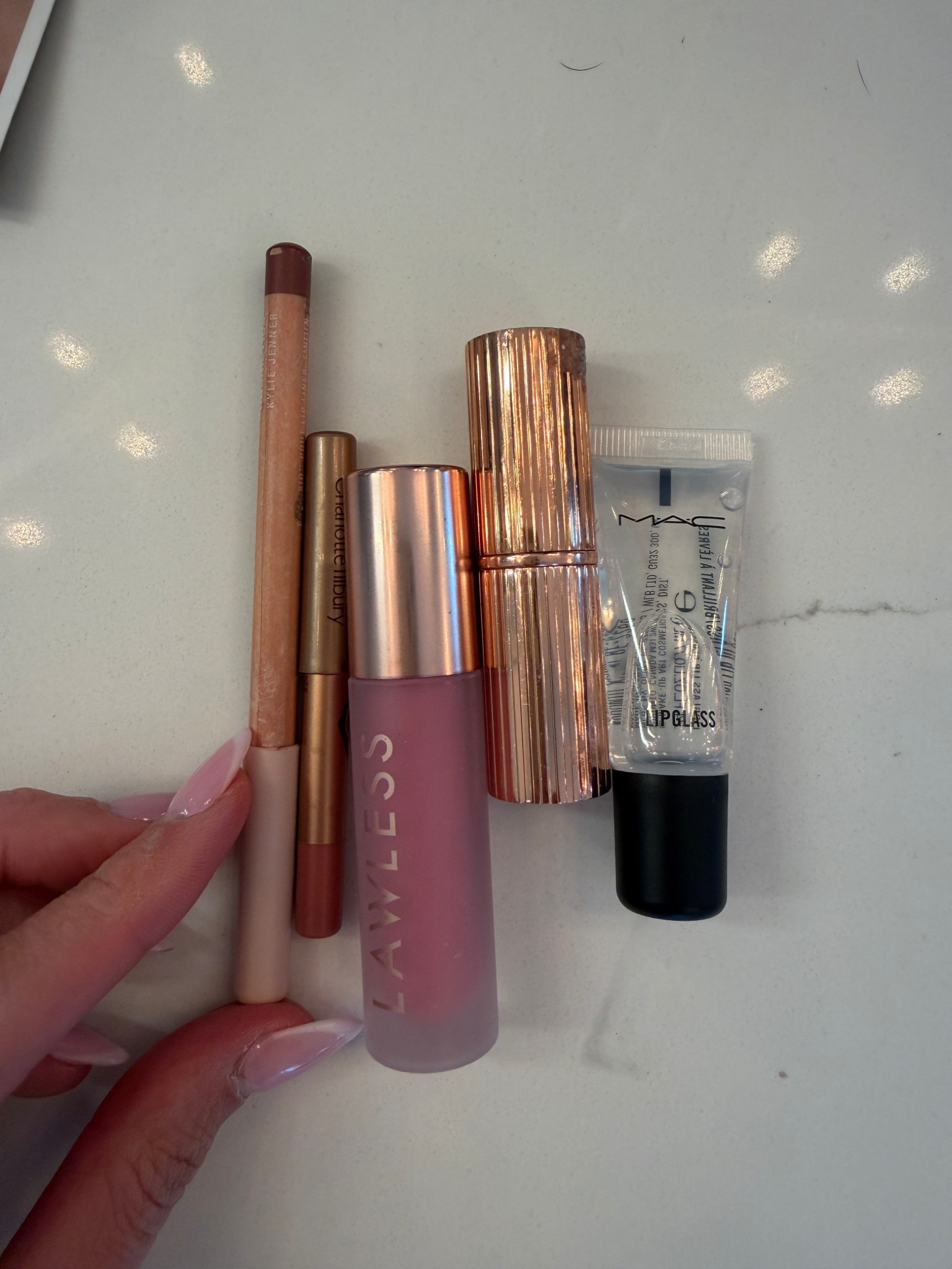 THE lip combo 🙌🏼 you don’t necessarily need the Mac lip gloss on top of the lawless because the lawless gloss is already very glossy!!!! I just like the Mac is sticky and kind of holds everything together! 

Smitten liner first 
The CT pillow talk liner 
The CT pillow talk lipstick in fair 
Then lawless gloss 
Then Mac (optional) 


#LTKBeauty