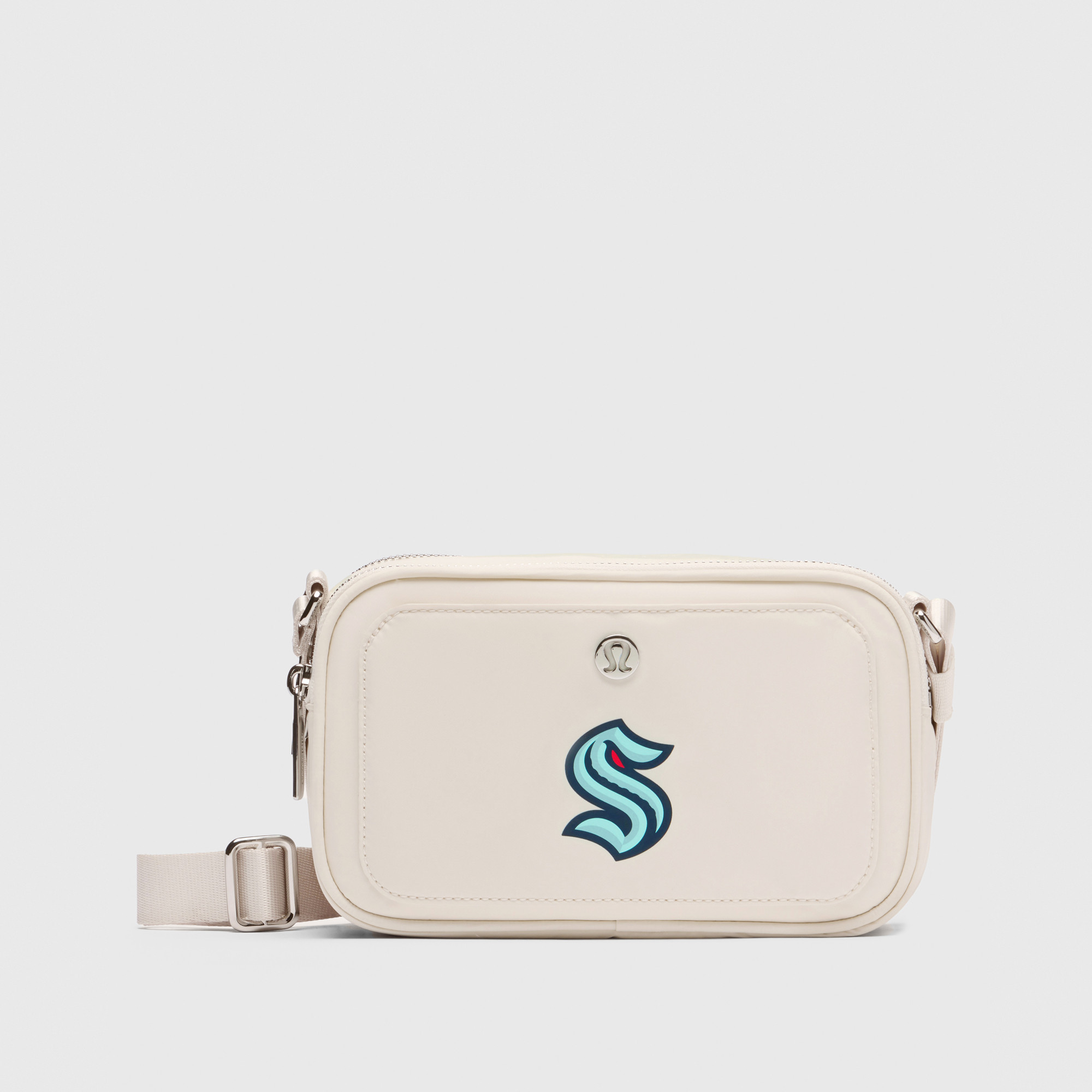 lululemon  Light Ivory Seattle Kraken Crossbody Camera Bag | Fanatics