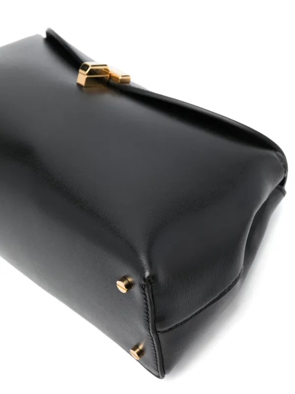 T-Lock leather clutch bag | Farfetch Global