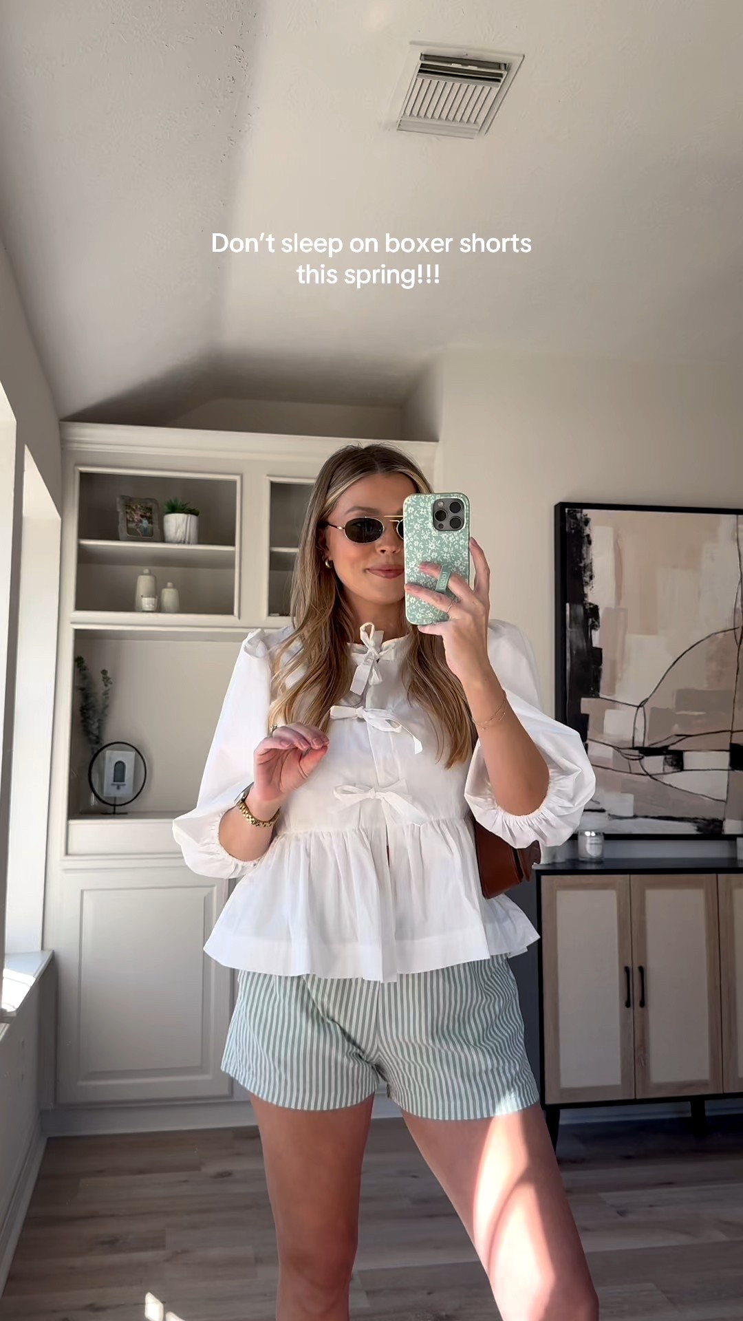 Casual spring outfit | I love throwing on boxer shorts, so comfy but looks so cute! Wearing size M in boxer shorts and sports bra tank. Size S in bow top. Sandals are tts  

#LTKStyleTip #LTKFindsUnder50