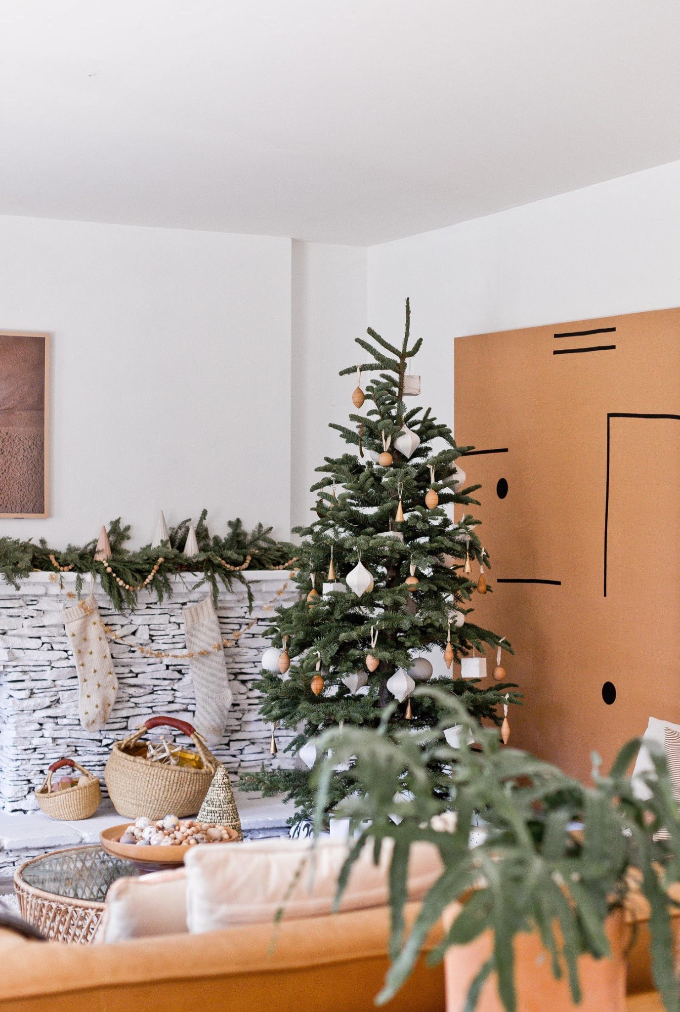 Christmas decor for the holidays featuring neutral colors and minimal designs - tree skirts - garland - fresh wreath - ornaments

#LTKSeasonal #LTKHome #LTKHoliday