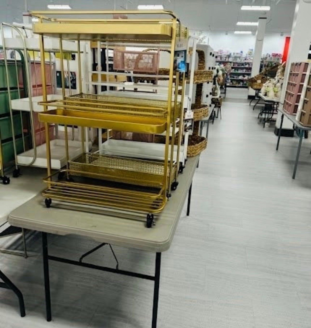 Organized but make it glam! This gold tiered rolling cart is a total chameleon—use it as a chic bar cart for your next party, a coffee station, or even extra storage in your office or bathroom. The geometric metal detailing is so unique! Truly a "run, don't walk" find

#LTKHome