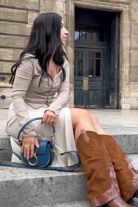 How to dress like a Parisian ? Wear those camel boots, a silk skirt, a cardigan, and Chloé bag. 
I swear as Fashion Editor in Paris, those kind of boots are one of the biggest trend of fall winter 2022-2023.

#LTKEurope #LTKfashion #fashionoutfit #outfitideas #falloutfit #outfitidea #minimalstyle #howtobeparisian #parisianstyle

#LTKSeasonal #LTKunder50 #LTKunder100