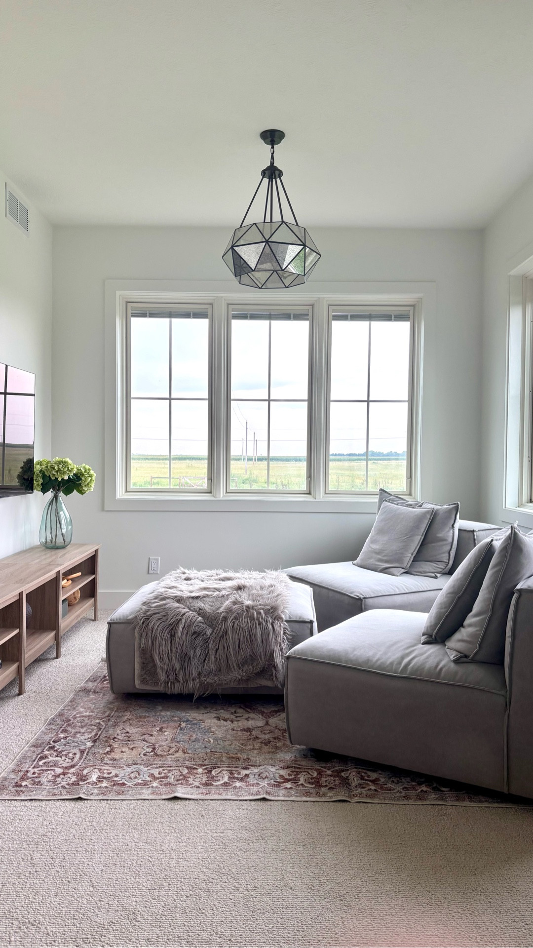 This space was functional but lacking some detail to make it pretty.  I repurposed the other half of the sectional to the office, added an affordable Amazon rug, but the best thing was the Walmart media console.  It was one of the few pieces I found to be long but shallow enough to fit the smaller space.  Comment SHOP for the details.  Thank you for following and have a great week! 

#diy #farmhouse #arhaus #readingroom #smalllivingroom #sittingroom #homedecorating #homeinspo #studiomcgee

#LTKHome