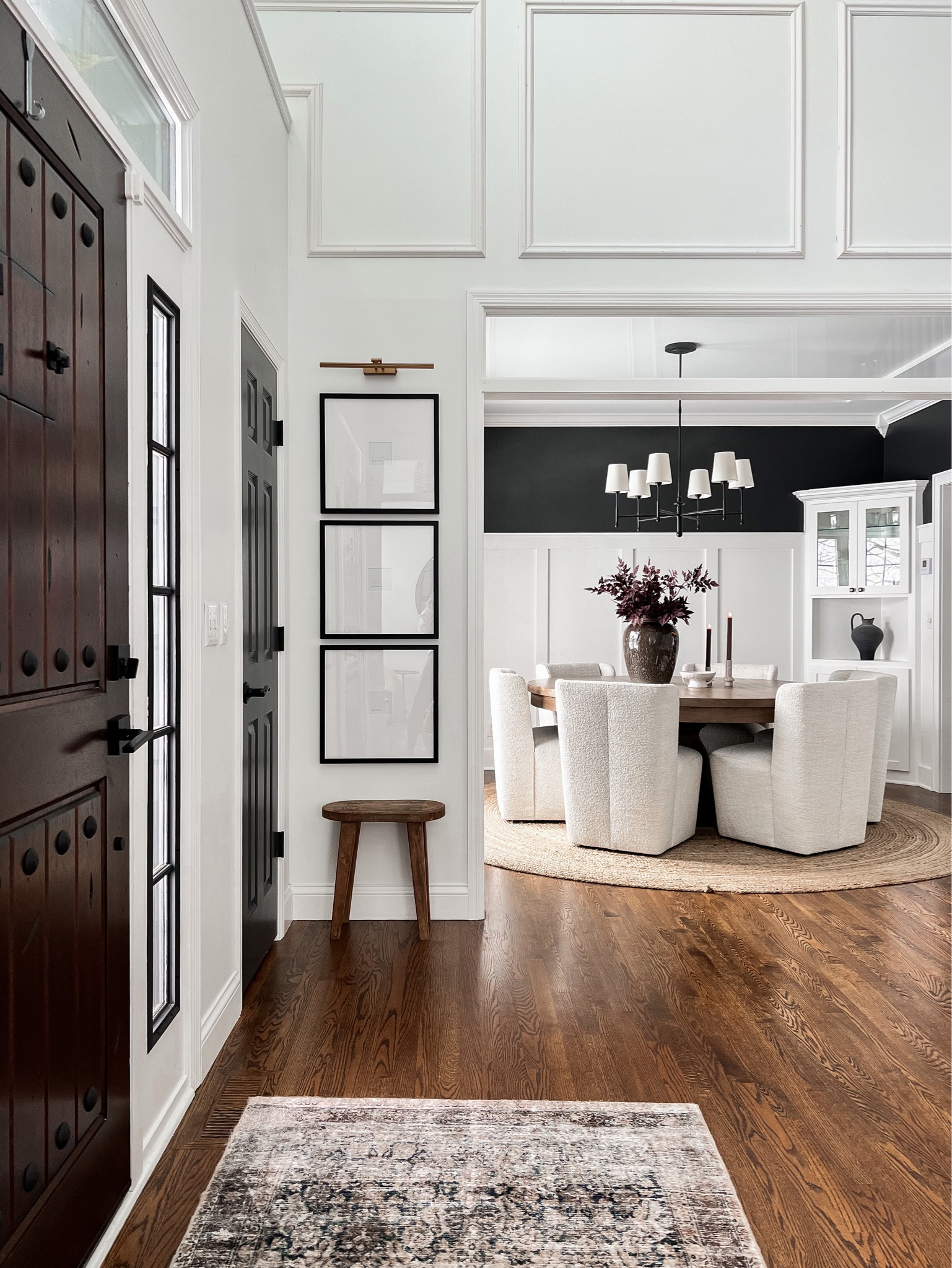 A welcoming entry way and inviting dining room for the neutral
Home lover, round dining table, dining room chandelier, gallery frames 

#LTKhome #LTKstyletip #LTKFind