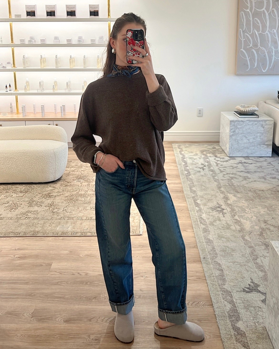 Casual work outfit / fall outfit 

Brown sweater- I love this cashmere sweater from reformation! This is my second color. Wearing a small 

Barrel jeans / cuffed jeans - size down 

Rothy’s clogs - run true to size 

Silver earrings / huggie hoops / not heavy! 

#LTKxMadewell #LTKWorkwear #LTKShoeCrush