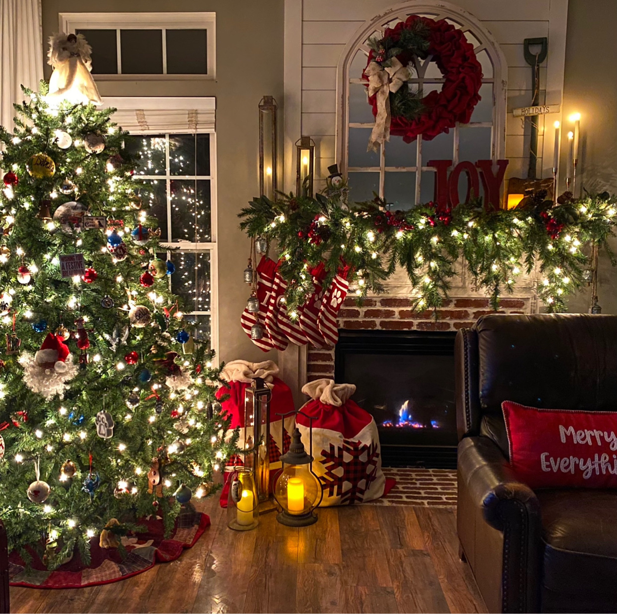 Cozy living room Christmas decor 

Fireplace, mantel, mantle, Christmas tree, garland, stockings, flameless candles, 

#LTKHoliday #LTKSeasonal #LTKhome