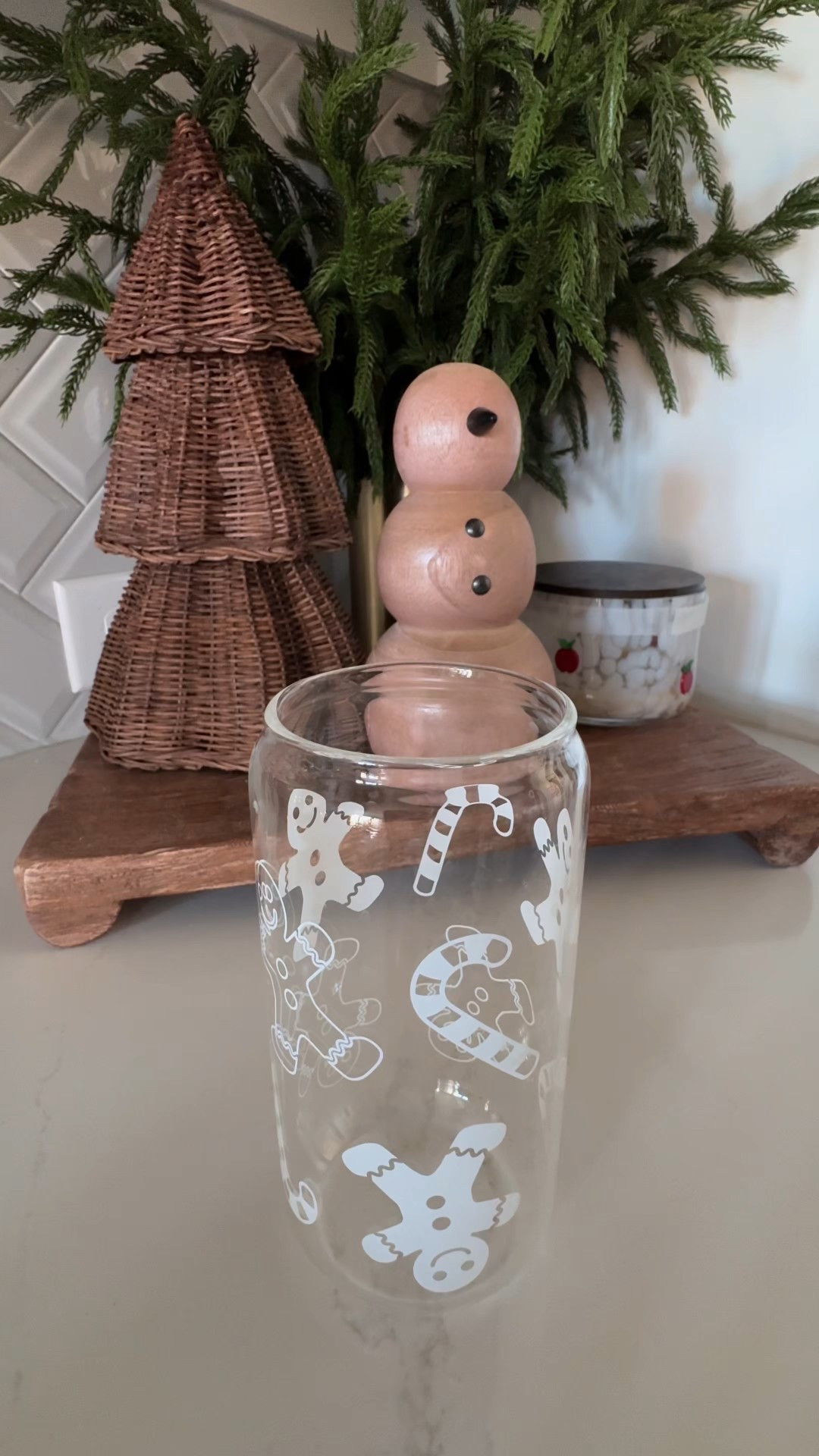 Still not feeling 100% but I’m trying to manufacture the energy to take Halloween down…at least before Thanksgiving 😂😂😂.  Got this glass Christmas cup last year in a set and I love it! These also make great Christmas gifts!! I pair them with a glass straw and they just look so cute! From Amazon! The Christmas decor in the background is also linked! The wooden snowman is such a great affordable option and looks just like the Pottery Barn one!! The wicker trees are Target! 

#LTKHoliday #LTKSeasonal #LTKHome