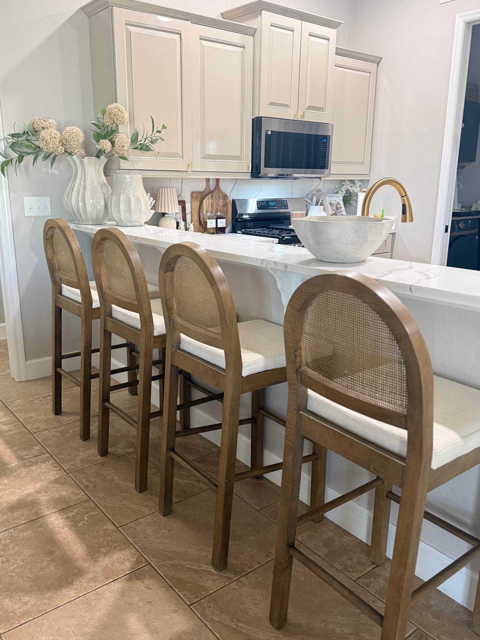 These @Wayfair stools instantly elevated my kitchen 🤍
These Counter Stools have the prettiest warm wood tone, woven rattan back, and soft boucle seat—exactly that elevated European, organic style I love.
They look so high-end and timeless ✨

#LTKHome