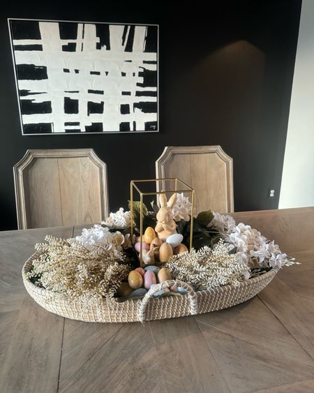 Easter floral basket arrangement. Can’t believe this used to be their baby changing basket 🥲 I like putting seasonal decor in it now! 

Easter decor. Spring decor. Floral arrangement. Dining room decor. Simple decor. Home decor ideas. 

#LTKhome #LTKSeasonal