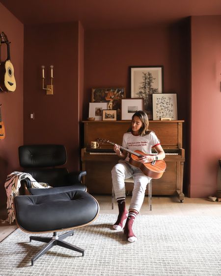 Your home is a reflection of YOU, so give your hobbies center stage. 

Music room, red paint, piano, lounge chair, guitars, framed art, taper sconce

#LTKstyletip #LTKhome