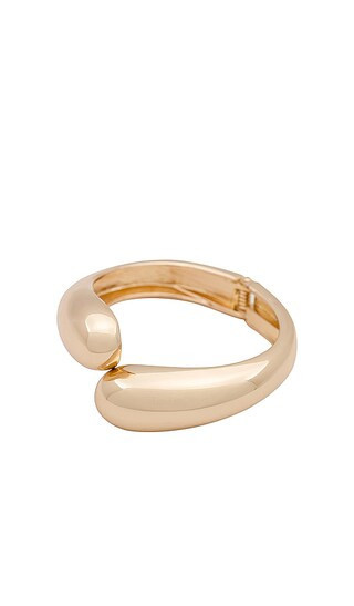 petit moments Livorno Cuff in Metallic Gold. | Revolve Clothing (Global)
