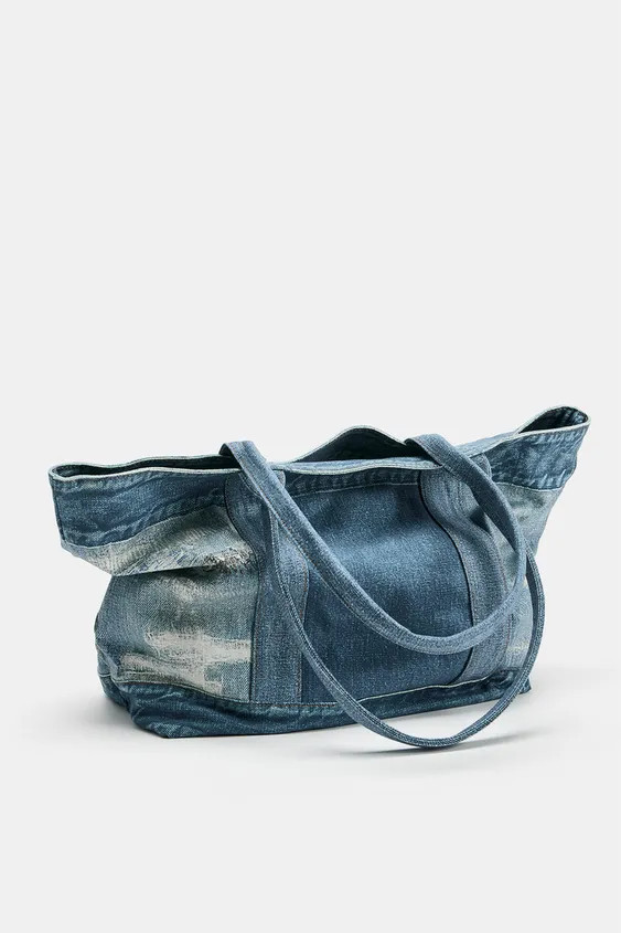 Shopper shoulder bag. Contrasting stitching detail on the body in color and materials. Interior z... | Zara US