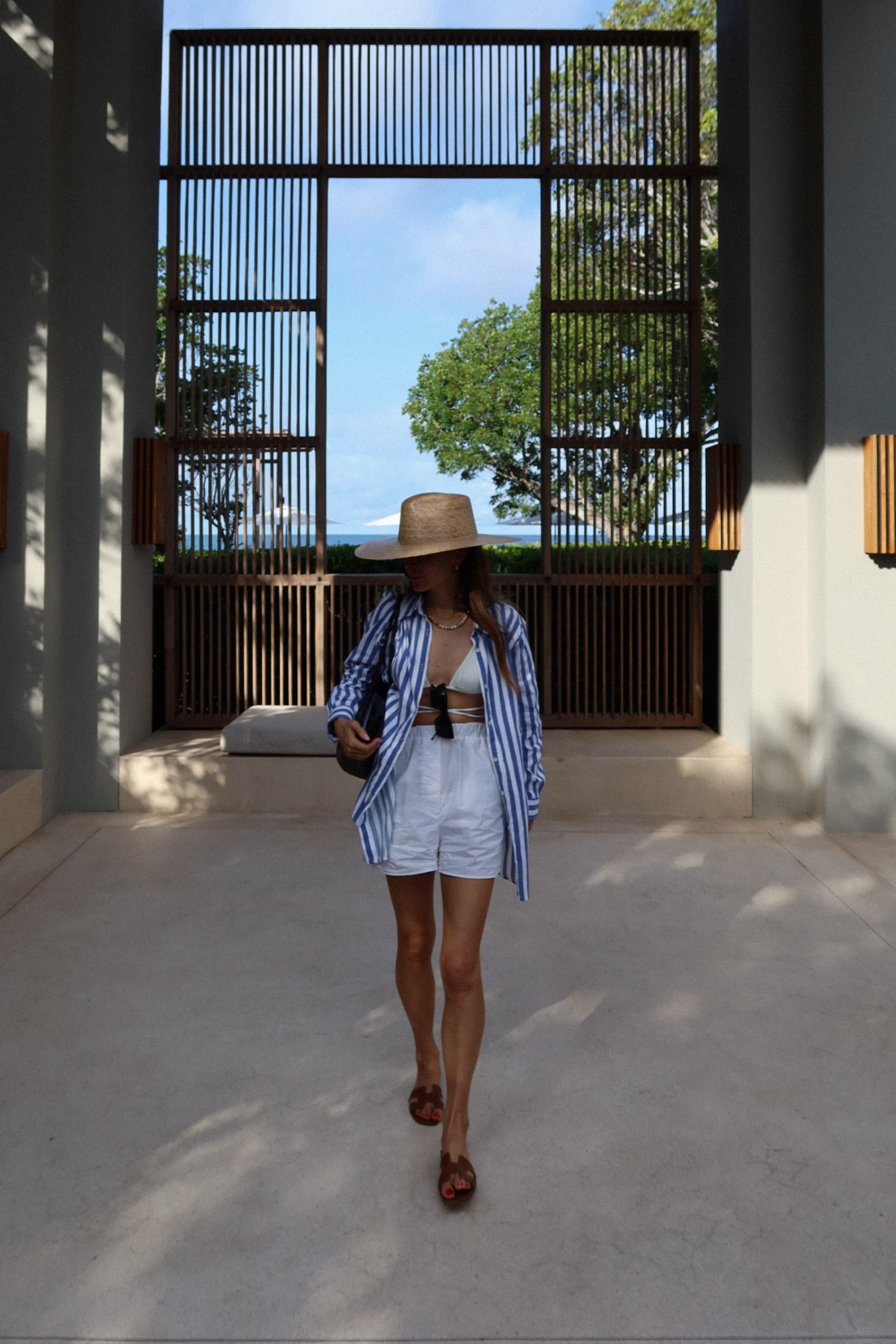 Reina olga, Frankie shop, Hermes, Dragon diffusion, Yaitte, summer outfit, holiday outfit, beach outfit, striped shirt, oversized shirt, white shorts, white bikini top, linen shorts, straw hat, beach hat, woven bag, beach outfits, holiday outfits, summer outfits

#LTKsummer #LTKstyletip #LTKeurope