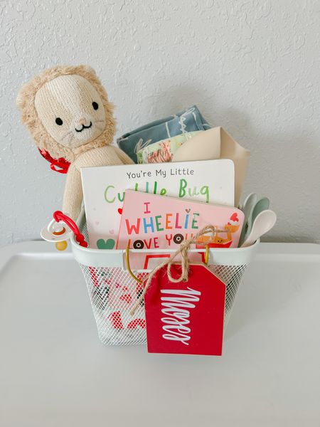 🤍 Moses’ 1st Love Basket 🤍
.
.
Y’all, boy baskets are tough! But, a baby basket is so much sweeter 🥰 
.
Since Moses just started foods, we stuffed his love basket with items to join us at the table 🥰 Here are some of my other favorites for 1st year baskets:

⚪️ Clothes
⚪️ Books- for their personal libraries 
⚪️ Feeding Items
⚪️ Toy or little buddy 
.
.
What are you gifting your littles for Love Day, tomorrow? 😍 

#LTKbaby #LTKGiftGuide #LTKkids