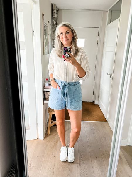 Outfits of the week. A beige and white striped linen shirt paired with paperbag waist denim shorts and Skechers sneakers. 



#LTKmidsize #LTKeurope #LTKover40