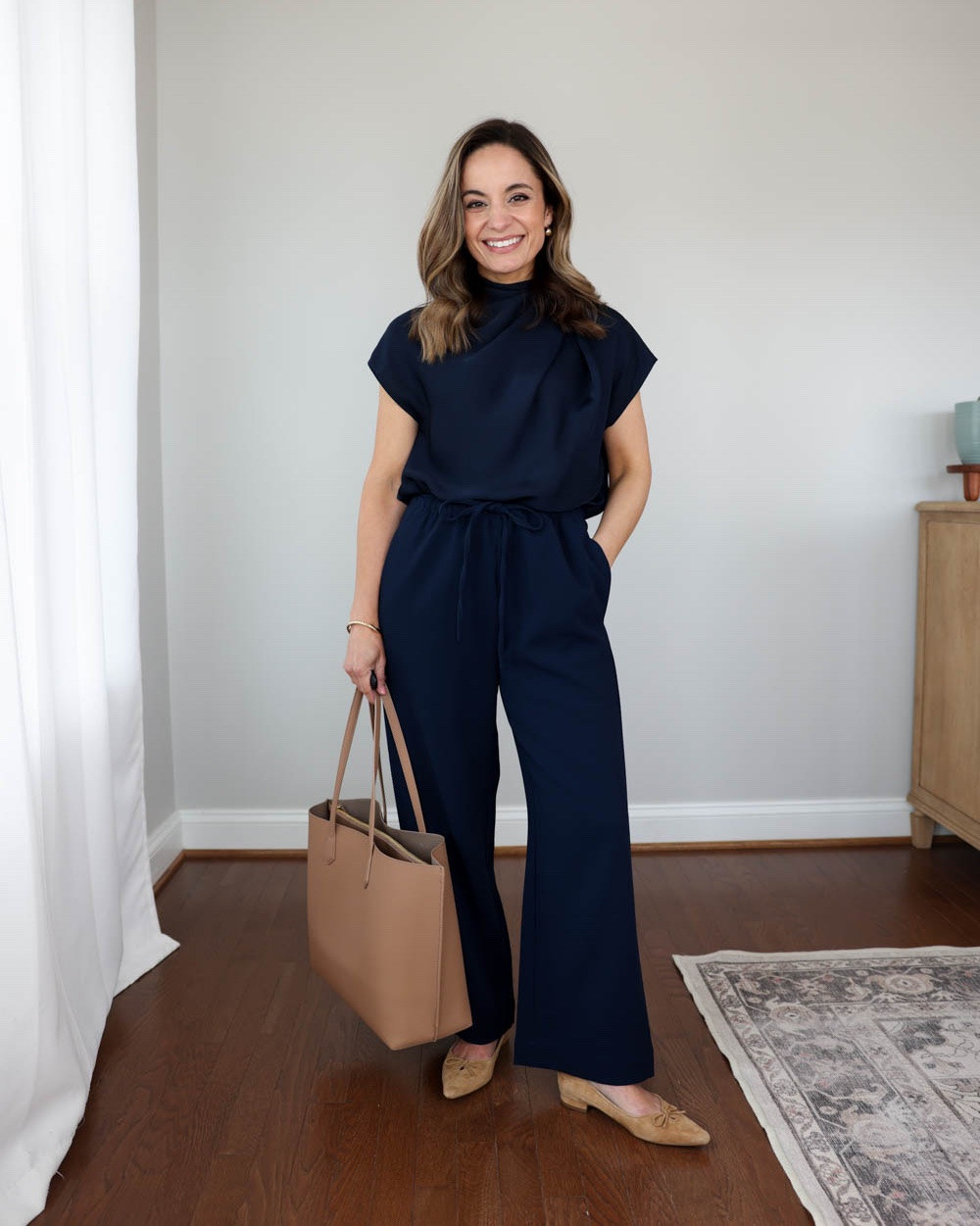 Three styles of comfortable flats to wear to the office!

Outfit 1:
Navy Pants (Aritzia): 2xs short - 28” inseam in short | in admiral
Satin Top (Aritzia): xxs 
Tote (Quince)
Shoes (Sam Edelman): true to size 

Outfit 2:
Floral Skirt (Nordstrom): xxs 
Top (J.Crew Factory): xxs 
Sweater (Quince): xs 
Flats (Sam Edelman): true to size

Outfit 3:
Jeans (Quince): 24 x 26” - exact (sold out in white). I will link alternative options for them. 
Jeans (BR Factory): petite 25 | 10” rise, 27” inseam - option 
Top (J.Crew Factory): petite xxs/00 
Shoes (Steve Madden): true to size

My measurements for reference: I’m 4’10” and 105lbs. My bust, waist, and hip measurement is 32”, 24”, and 36”.

#LTKootd #LTKPetite #LTKWorkwear