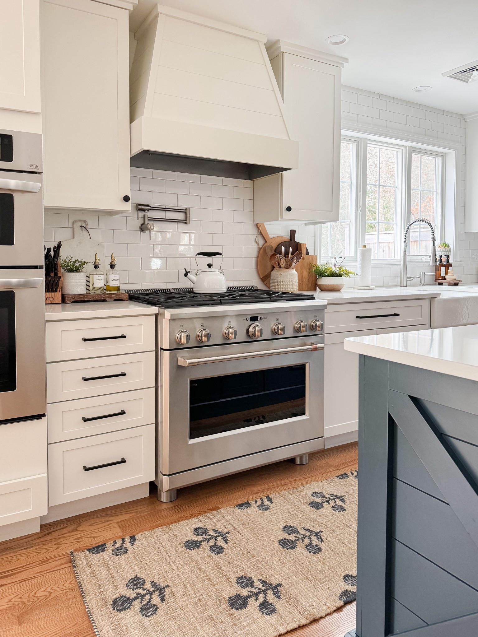 Coastal kitchen styled with navy island, white cabinets, neutral runner rug, and simple kitchen decor for a light and layered coastal space.

coastal kitchen decor, navy kitchen island, neutral kitchen runner rug, white cabinet kitchen, coastal kitchen styling, neutral kitchen decor, light coastal kitchen design, kitchen island runner rug, sherricalnanhome

#LTKHome