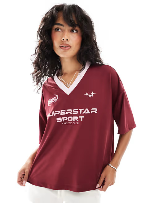 ASOS DESIGN oversized varsity shirt with sports graphic in burgundy | ASOS | ASOS (Global)
