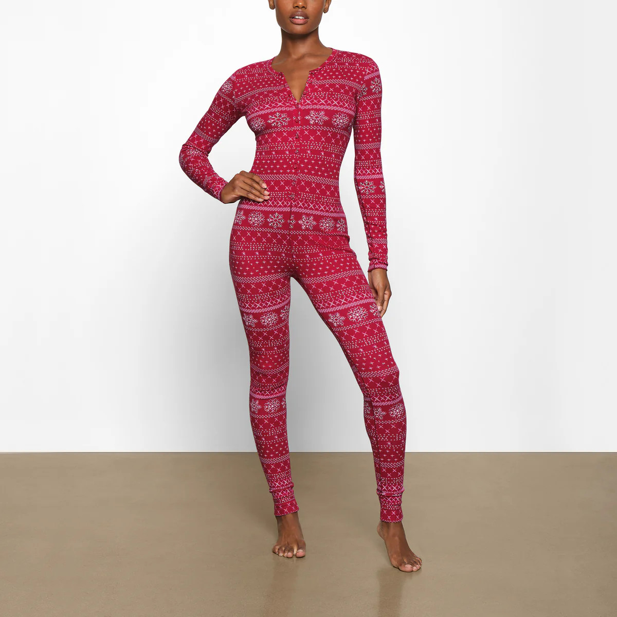 LOGO POINTELLE HENLEY ONESIE | SKIMS (US)