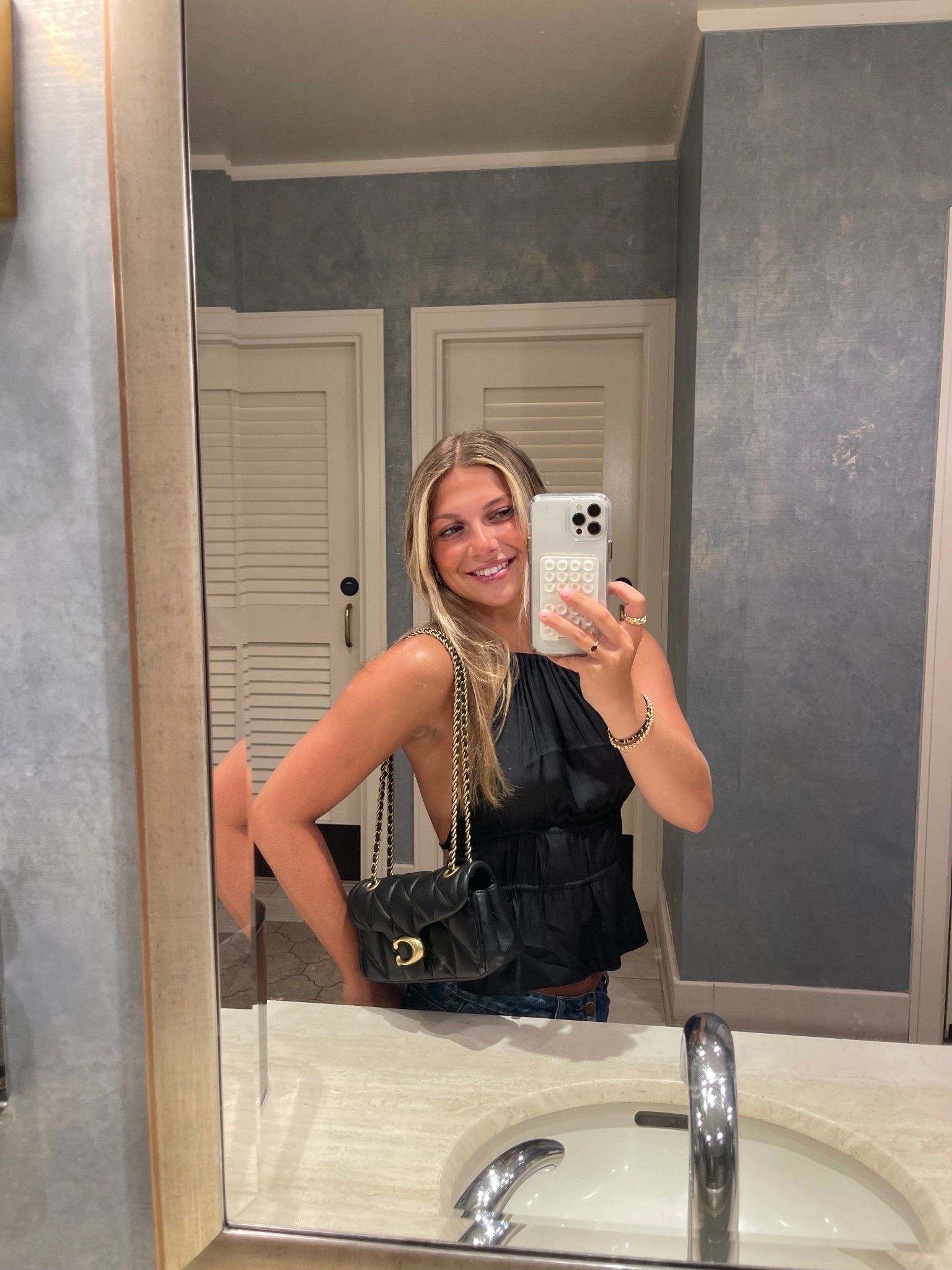 black satin top with black coach bag 
black top
satin top
black purse
coach bag 
little black purse 

#LTKItBag #LTKStyleTip