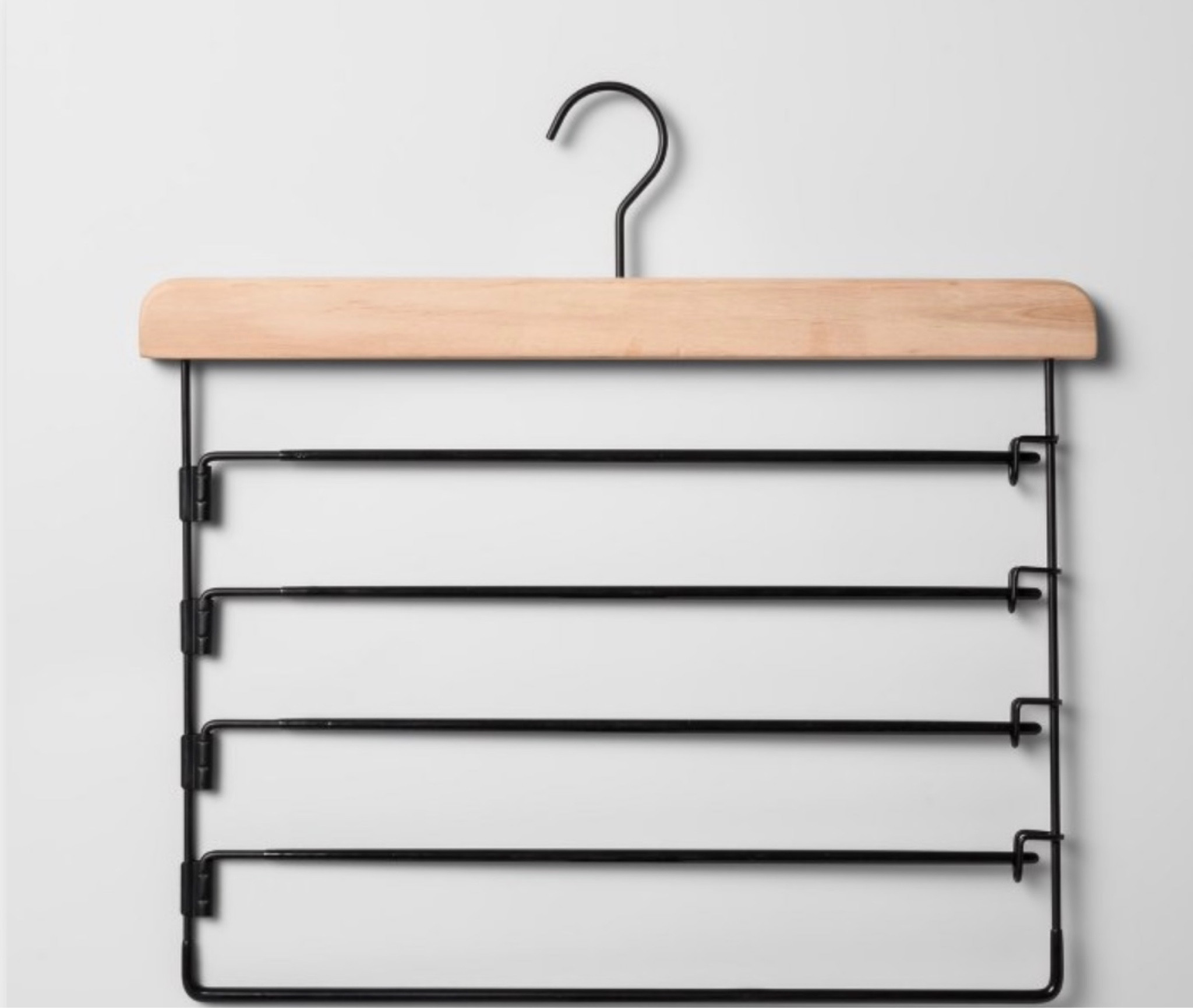 Matching pant hanger from Target's Brightroom line! I don't hang more than 3 at a time depending on weight of the pants, but saves space in closets really well if you're pinched for closet real estate. A closet must and making me feel like The Home Edit 😉

#LTKfindsunder50 #LTKhome #LTKfamily