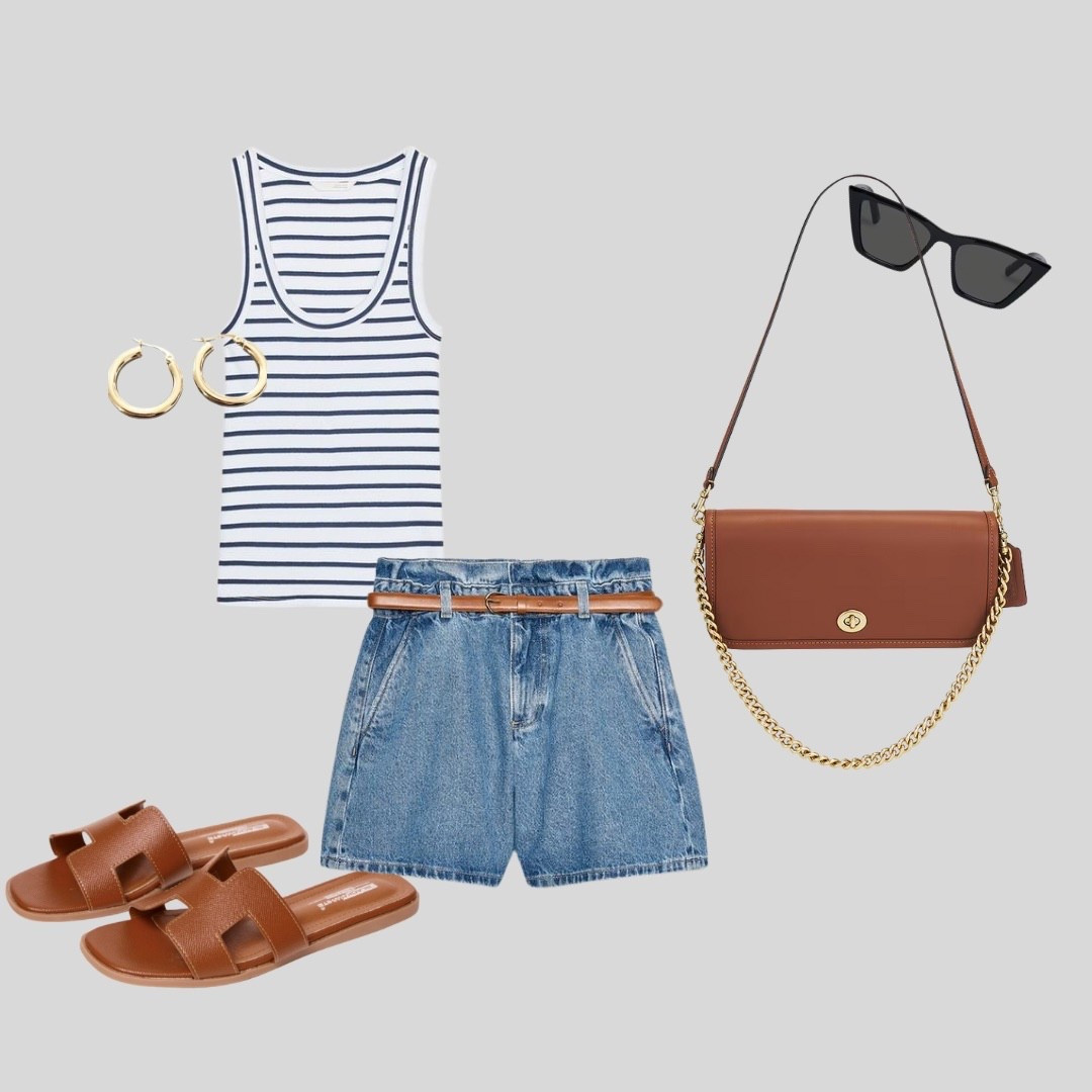 Casual everyday look featuring a navy and white striped tank top, high-waisted denim shorts with a tan belt, and brown slide sandals. I added a structured brown crossbody bag with a gold chain, gold hoop earrings, and black rectangular sunglasses to complete the look — perfect for an easy, laid-back summer day.
