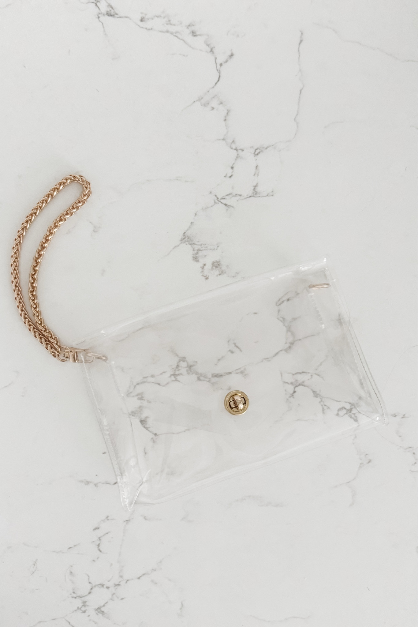 Who says stadium bags have to be ugly? I wore this clear crossbody to the Eras Tour last year, and it would also be perfect for any other concert / sporting event. The size is small enough for stadium requirements, but big enough to fit the essentials (yes, even an iPhone Max). 

*addiitonally, while I love this bag as a crossbody, the venue where my concert is located in December requires that bags not have long straps so thankfully I was able to convert it to a wristlet with a strap swap! There are multiple designs and metal colors depending on your personal style. Very pleased with this item so far.

I also ordered a little card wallet with a chain on it that I plan to attach to the strap link on the other side, opposite the wristlet chain. You can find the link below as well!

#LTKItBag #LTKParties