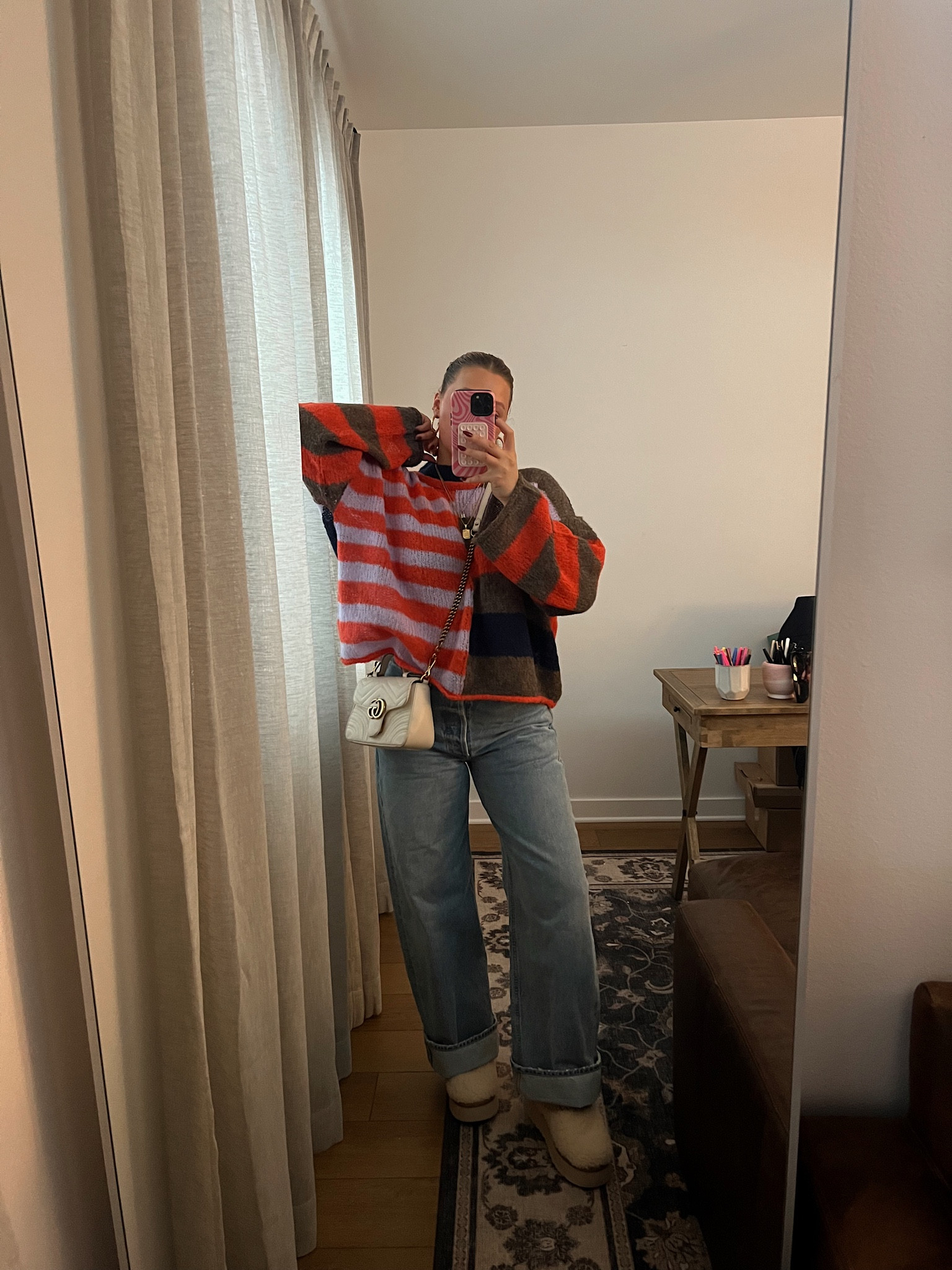 Jeans size down 2! Wearing a 28 and you can in cuff them. I’m 5’ 5” for reference! Size M in free people sweater it’s soft and super lightweight and I love how vibrant it is. Size up in sherpa uggs!

