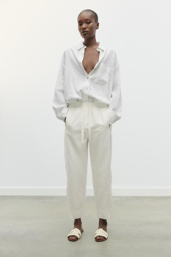 FLAT CROSSED LEATHER SANDALS | Zara US